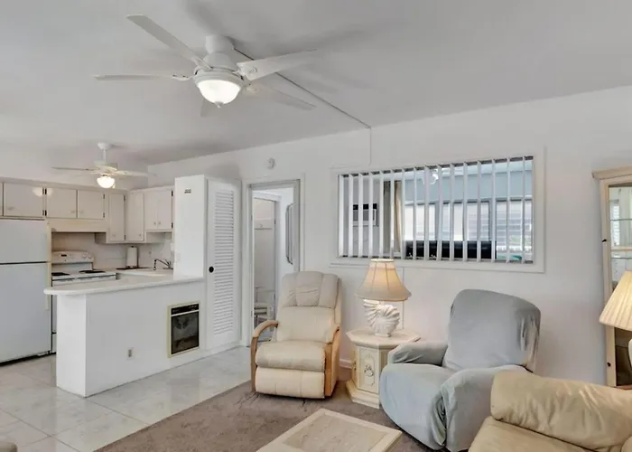 One Bedroom Condo With Waterfront Balcony And Coastal Breezes